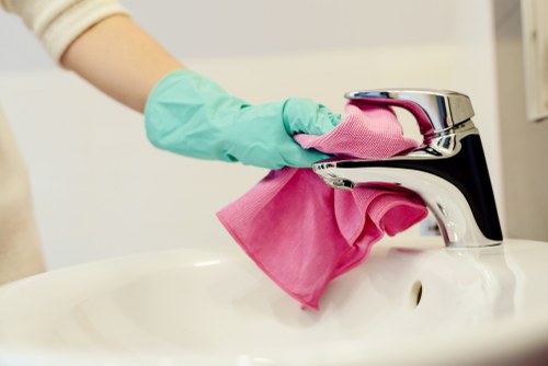 Professional mattress cleaning process on a clean bed