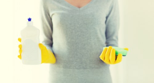 Professional domestic cleaning in a modern kitchen